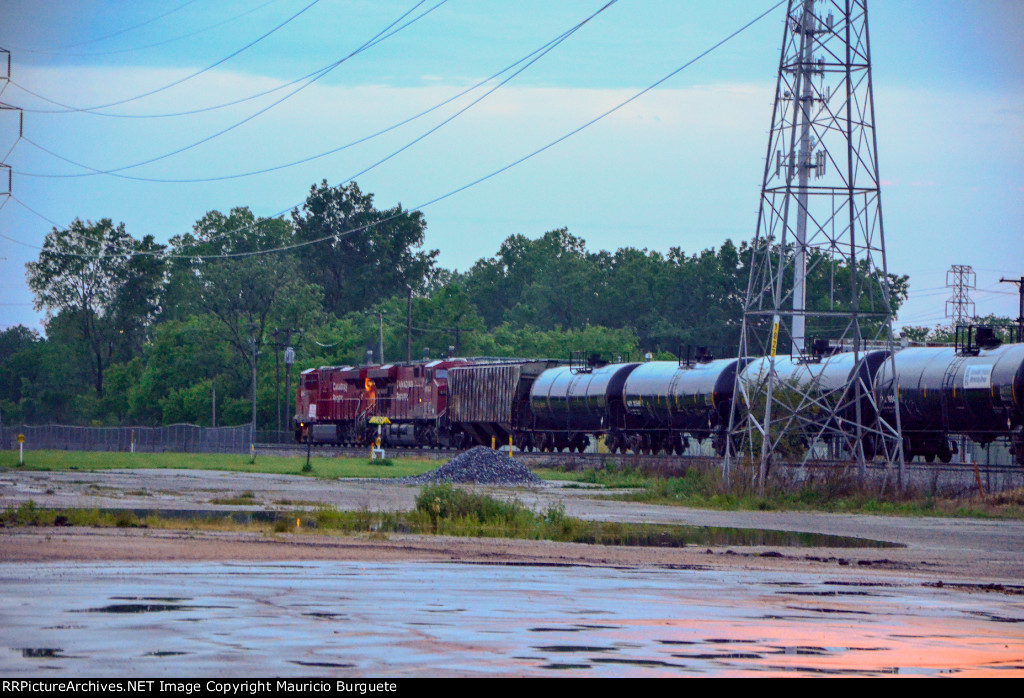 CP ES44AC Locomotives leading a train